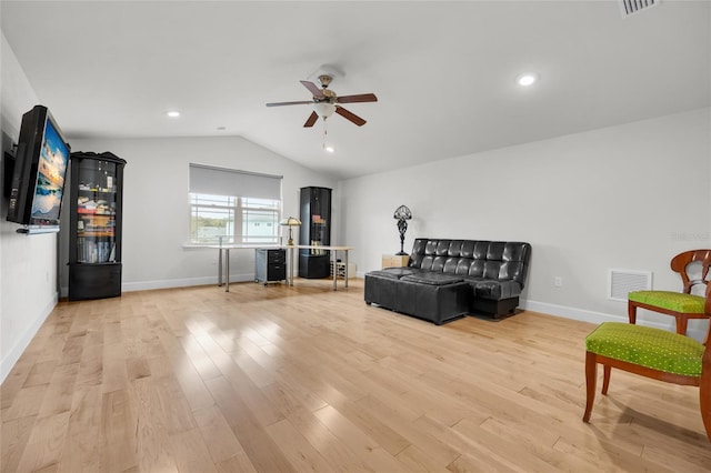 sitting room featuring vaulted ceiling, light hardwood / wood-style flooring, and ceiling fan