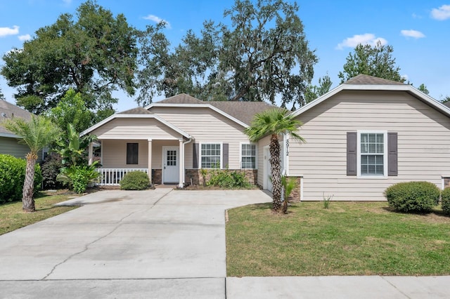 view of front of home with a front lawn and covered porch