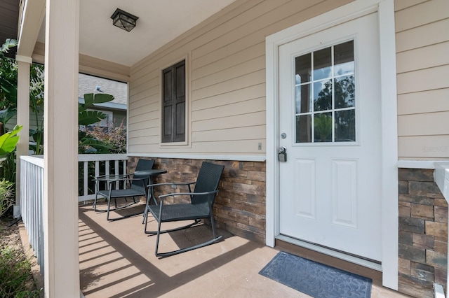 property entrance with a porch