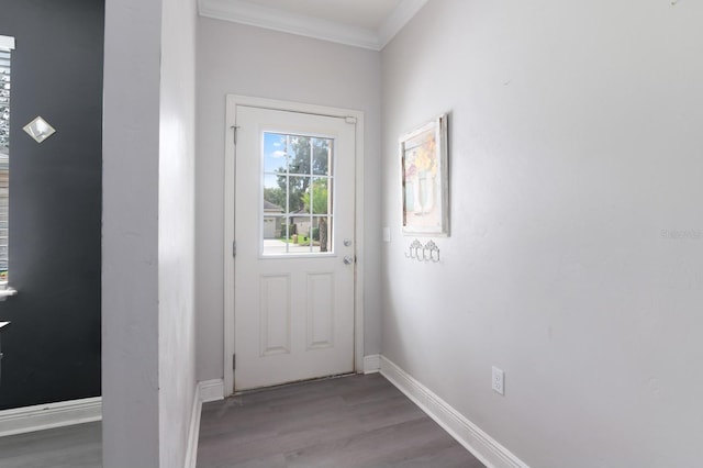 doorway featuring hardwood / wood-style flooring and crown molding