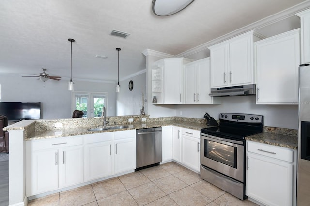 kitchen featuring sink, kitchen peninsula, decorative light fixtures, white cabinetry, and appliances with stainless steel finishes