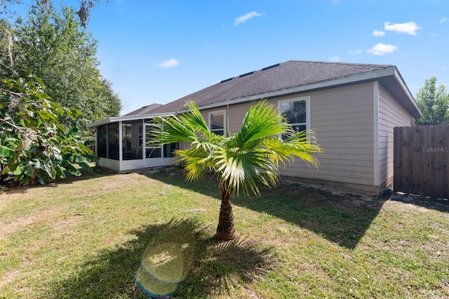 view of yard featuring a sunroom