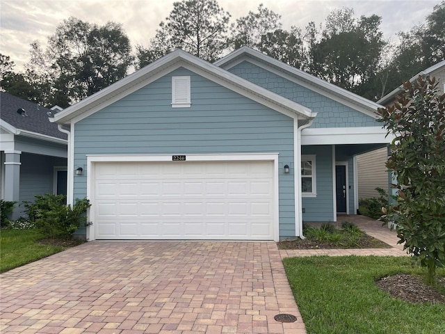 view of front of house with a garage