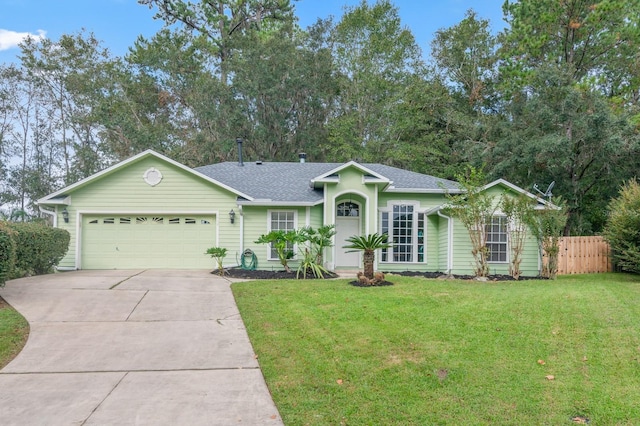 ranch-style home featuring a front yard and a garage