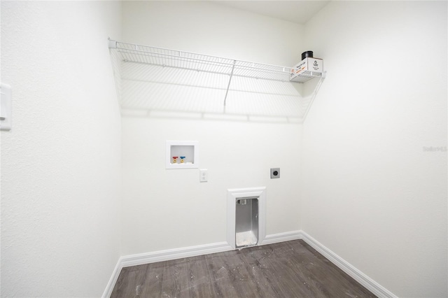 clothes washing area with hookup for a washing machine, laundry area, dark wood-style flooring, baseboards, and electric dryer hookup