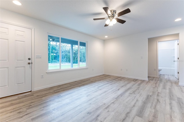 interior space featuring ceiling fan and light wood-type flooring