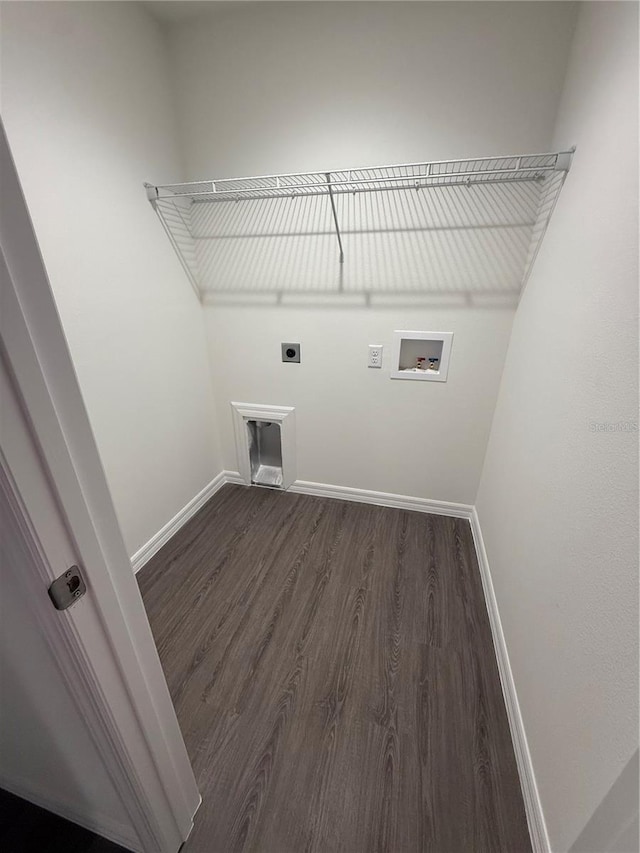 clothes washing area featuring hookup for a washing machine, dark hardwood / wood-style flooring, and electric dryer hookup