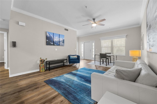 living room featuring ornamental molding, ceiling fan, and dark hardwood / wood-style flooring