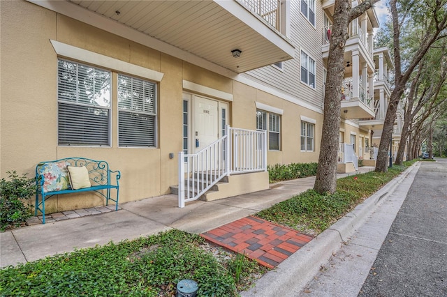 doorway to property with a balcony