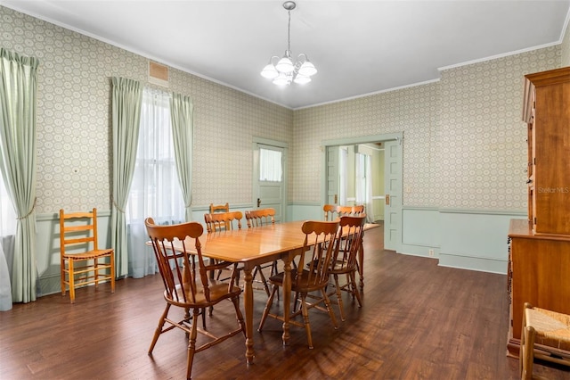 26502 NW 3rd Ave, Newberry, FL 32669 - dining area featuring an inviting chandelier, crown molding, dark wood-type flooring, and wallpapered walls