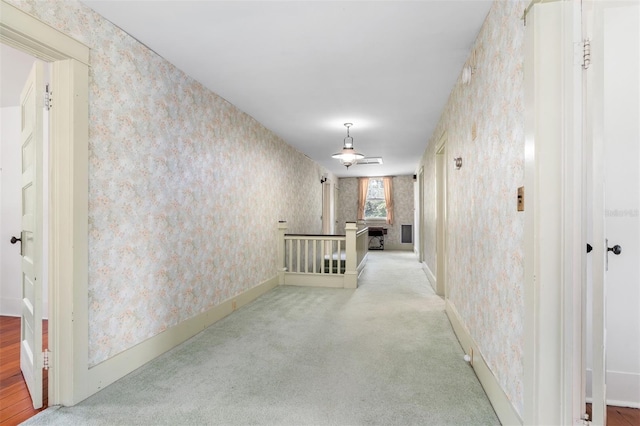 26502 NW 3rd Ave, Newberry, FL 32669 - hallway with wallpapered walls, baseboards, and carpet