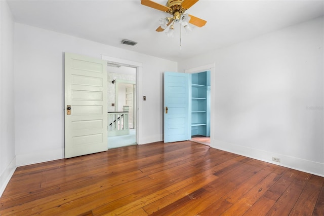 unfurnished room featuring wood-type flooring and ceiling fan