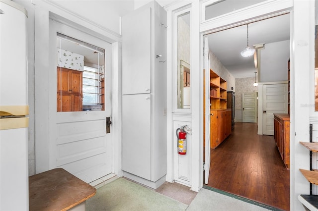 hallway with light wood-type flooring