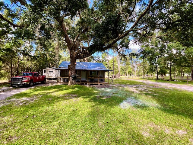 ranch-style home with a front yard