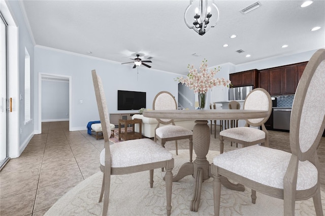 dining room featuring ornamental molding, light tile patterned floors, and ceiling fan with notable chandelier