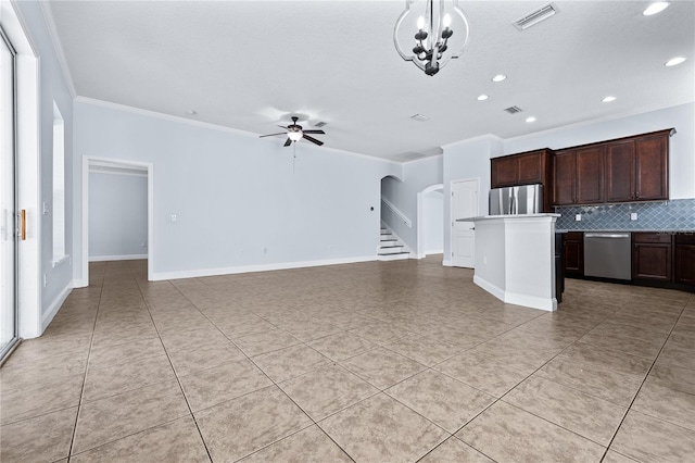 interior space featuring ornamental molding, light tile patterned flooring, ceiling fan with notable chandelier, and a textured ceiling