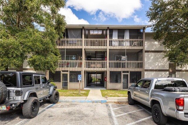 6519 W Newberry Rd Unit 805, Gainesville, FL 32605 - view of property with uncovered parking
