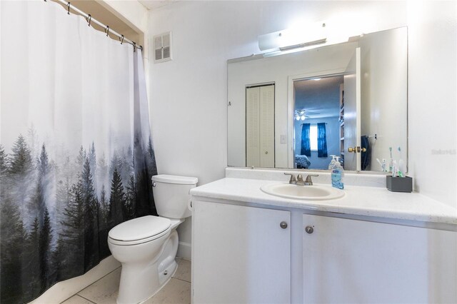 6519 W Newberry Rd Unit 805, Gainesville, FL 32605 - full bath featuring visible vents, tile patterned flooring, vanity, and toilet