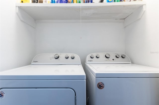 laundry room with separate washer and dryer