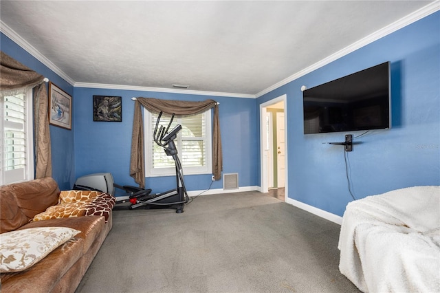 exercise room featuring ornamental molding, carpet, and a healthy amount of sunlight