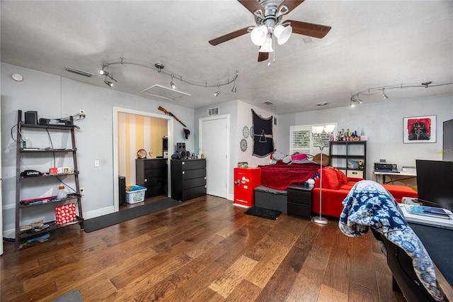 interior space with dark wood-type flooring and ceiling fan