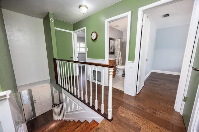 hall featuring dark hardwood / wood-style flooring