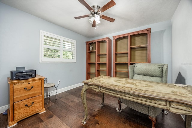 office space featuring ceiling fan and dark hardwood / wood-style flooring