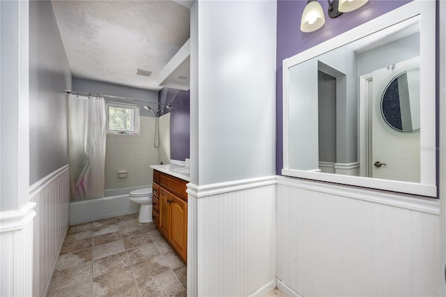 full bathroom with vanity, toilet, and shower / bathtub combination with curtain