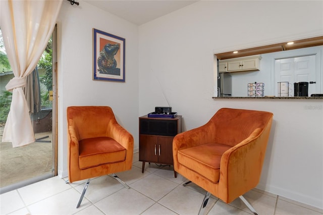 living area with light tile patterned floors