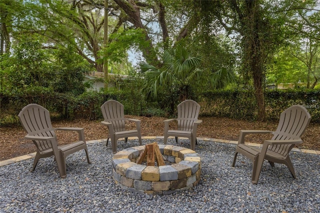 view of patio / terrace featuring an outdoor fire pit