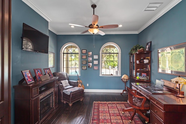 office space with crown molding, ceiling fan, and dark hardwood / wood-style flooring