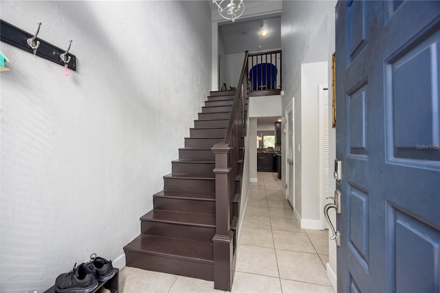 entrance foyer with light tile patterned floors