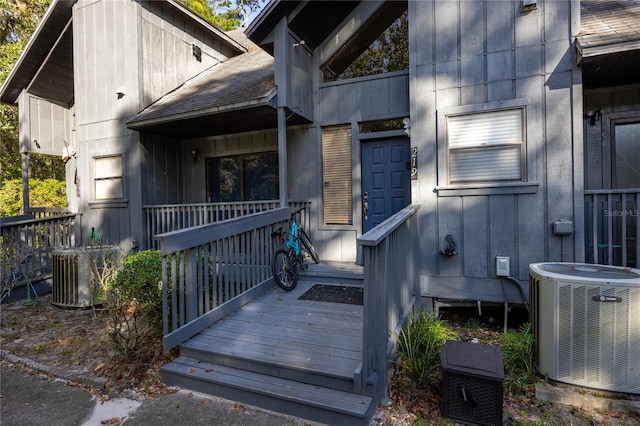 doorway to property with central air condition unit