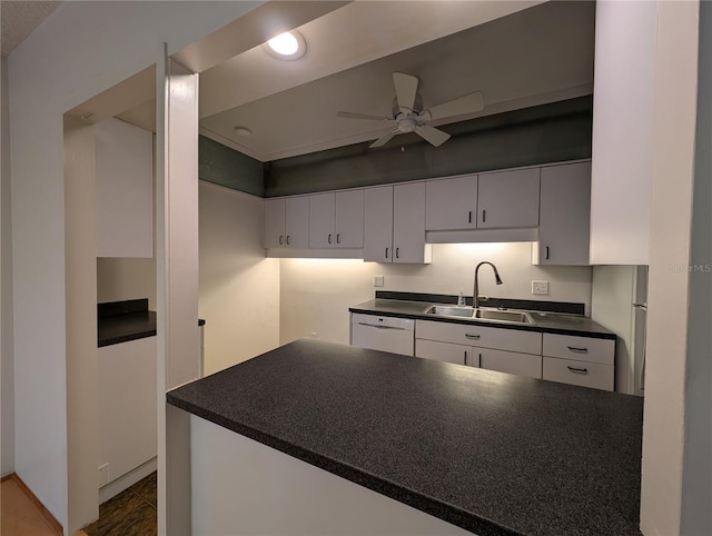 kitchen featuring sink, white cabinetry, white appliances, and ceiling fan