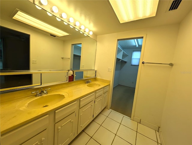 bathroom featuring vanity and tile patterned floors