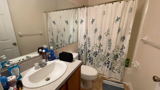 bathroom with vanity, a shower with shower curtain, toilet, and tile patterned floors