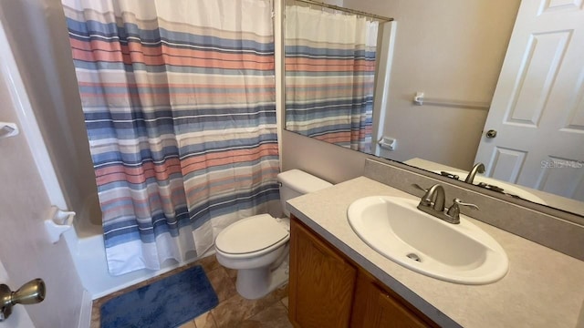 bathroom with vanity, toilet, tile patterned floors, and curtained shower