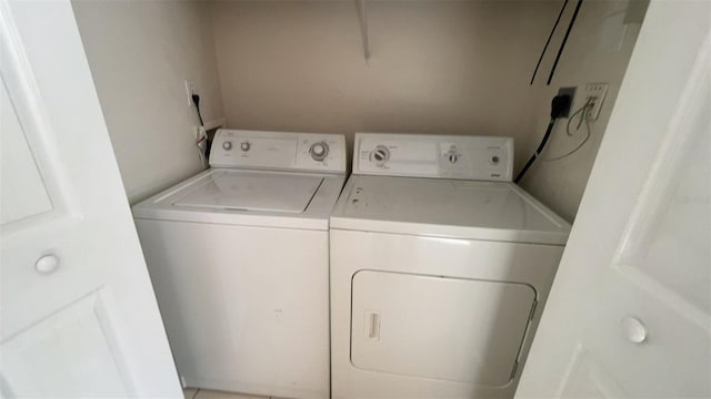 laundry area featuring independent washer and dryer