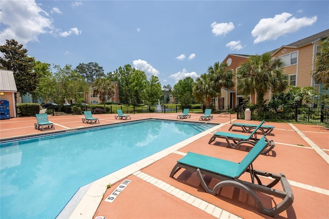 view of pool with a patio