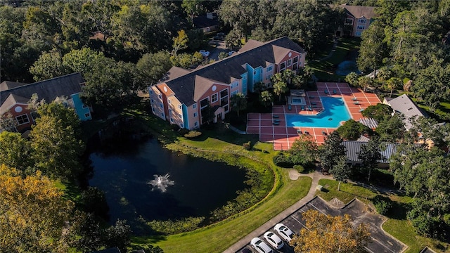 birds eye view of property featuring a water view