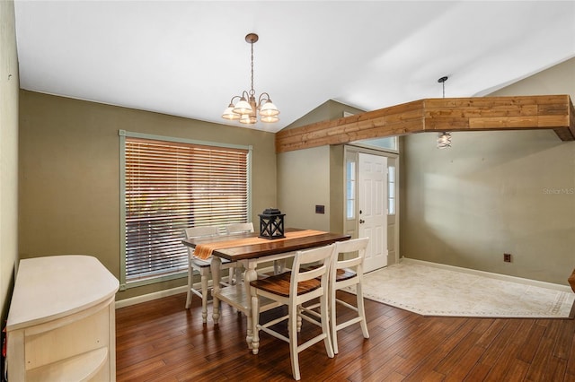 dining space featuring a notable chandelier, dark hardwood / wood-style floors, and vaulted ceiling