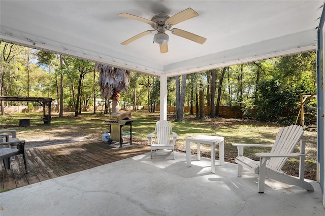 view of patio / terrace featuring a wooden deck and ceiling fan