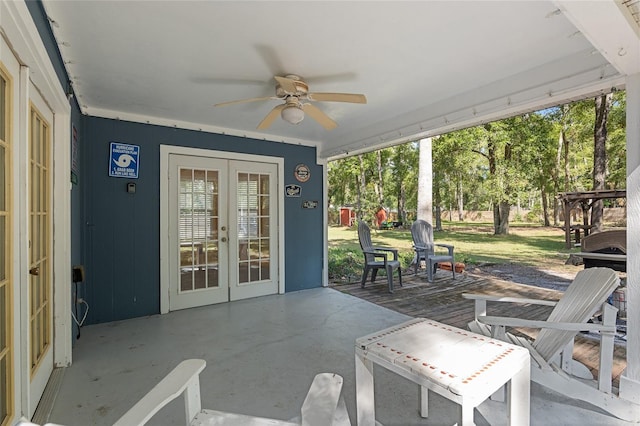 view of patio featuring french doors and ceiling fan