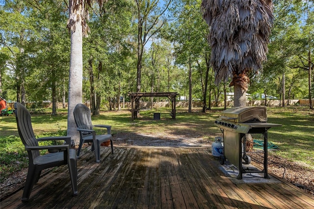 surrounding community featuring a yard and a deck