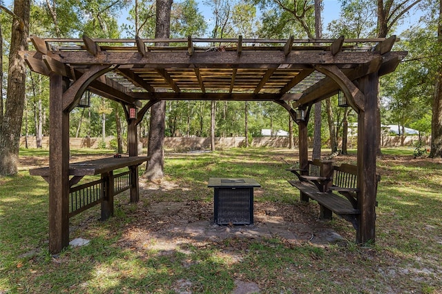 surrounding community featuring a yard and a pergola