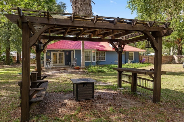 exterior space with french doors and a pergola