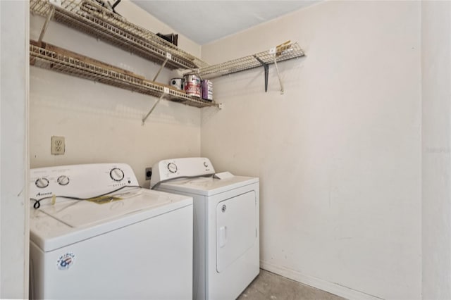 laundry area featuring washing machine and dryer