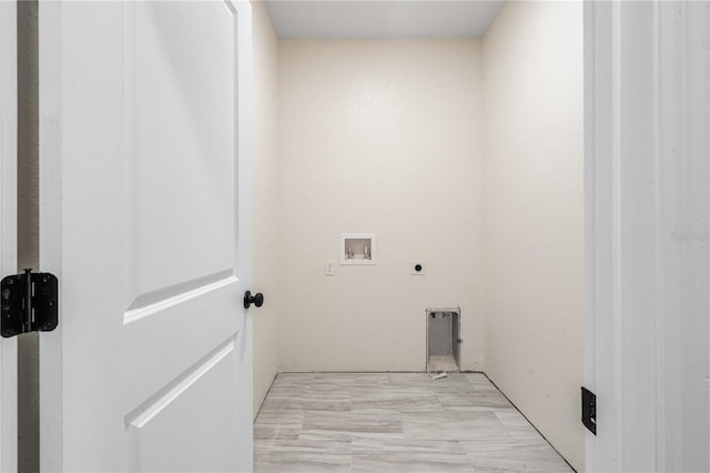 clothes washing area featuring electric dryer hookup and hookup for a washing machine