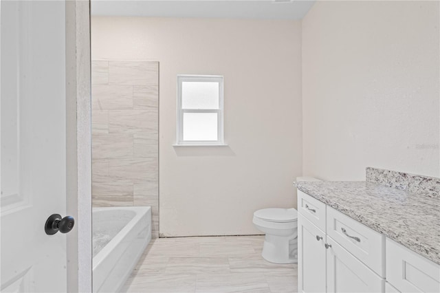 full bathroom featuring vanity, shower with separate bathtub, and toilet