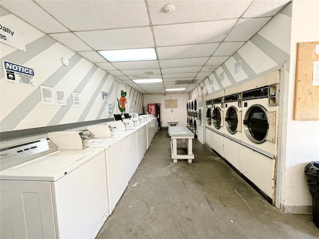 laundry area with washing machine and clothes dryer